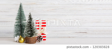 Christmas composition. craft Gift box, small tree, branches and craft DIY decorations on white background. New year concept. Christmas home decoration Flat lay, top view, copy space 120383828