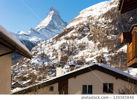 Snowy mountain Matterhorn during the day in winter. Zermatt, swiss alps Snowy mountain Matterhorn during the day in winter. Zermatt, swiss alps 120383848