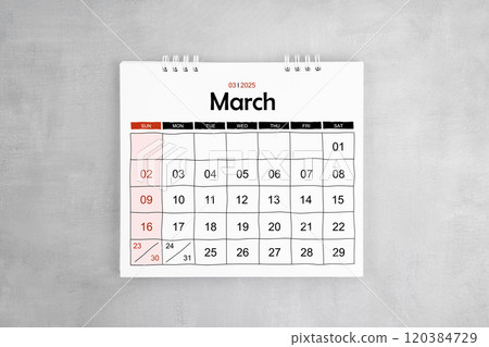 March 2025 desk calendar on gray cement wall background. 120384729