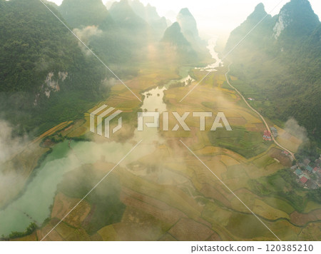 Drone aerial view of landscape mountains view in sunrise or sunset time,High angle view over countryside at northern Vietnam Drone aerial view of landscape mountains view in sunrise or sunset time,High angle view over countryside at northern Vietnam 120385210