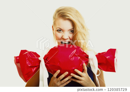 holidays love happiness concept - girl with red gift 120385729
