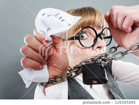 Furious woman with chained hands and contract 120385895