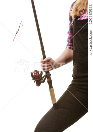 Woman hand holding fishing rod, spinning equipment Woman hand holding fishing rod, spinning equipment 120385938