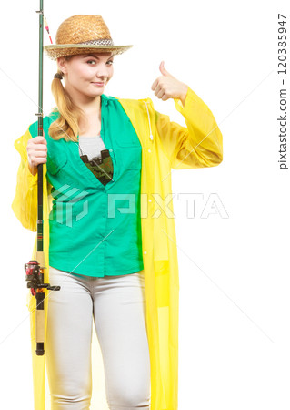 Woman with fishing rod, spinning equipment Woman with fishing rod, spinning equipment 120385947