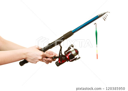 Person holding fishing rod, spinning equipment. 120385950