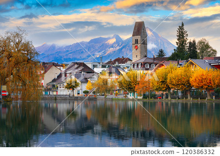 Interlaken, Switzerland on the Aare River at dawn with river reflections. 120386332