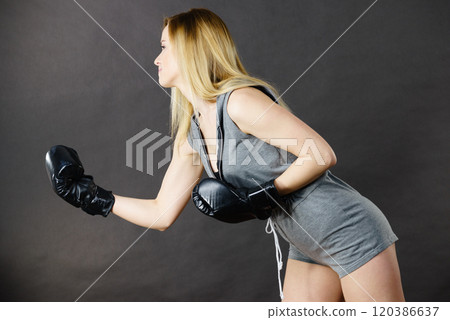 Boxer girl exercise with boxing gloves. Boxer girl exercise with boxing gloves. 120386637