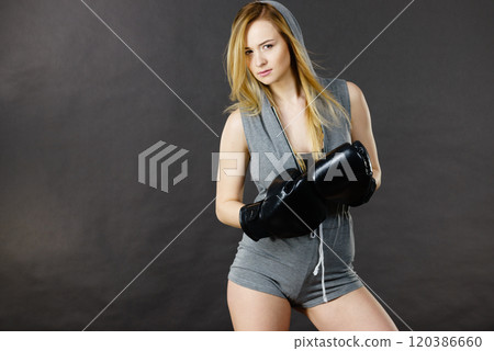 Boxer girl exercise with boxing gloves. Boxer girl exercise with boxing gloves. 120386660