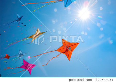 Beautiful greeting card with colorful kites soaring high above vibrant sky to holiday composition Beautiful greeting card with colorful kites soaring high above vibrant sky to holiday composition 120388034
