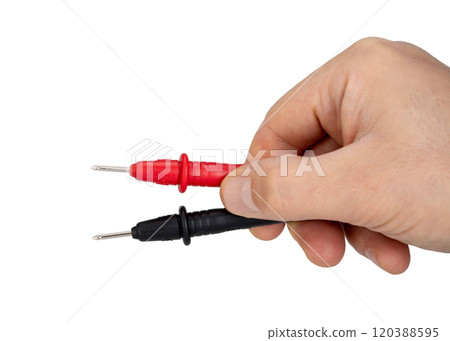 Hand Holding Red and Black Testing Probes Close Up 120388595