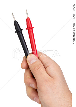 Hand Holding Red and Black Multimeter Probes Upright Hand Holding Red and Black Multimeter Probes Upright 120388597