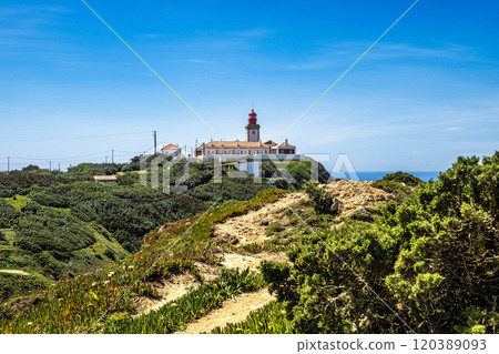 Lighthouse on Cabo da Roca - Roca Cape in Portugal, westernmost point of the Sintra Mountain Range and Europe 120389093