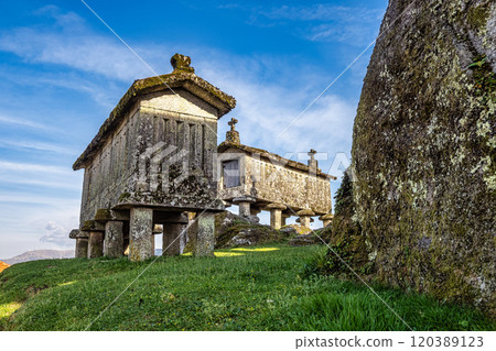 The communitarian granaries, called espigueiros, in the village of Soajo, Peneda National Park, Northern Portugal 120389123