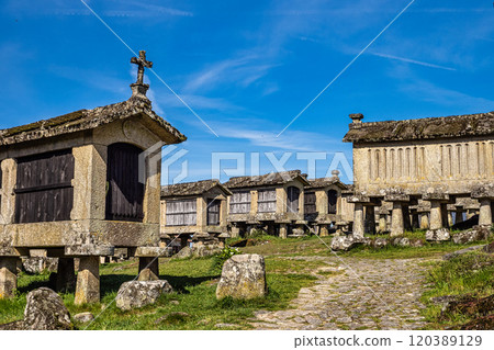 The communitarian granaries, called espigueiros, in the village of Lindoso, Peneda National Park, Northern Portugal 120389129