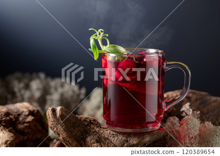 Hot drink with cranberries, lime, and rosemary. Hot drink with cranberries, lime, and rosemary. 120389654