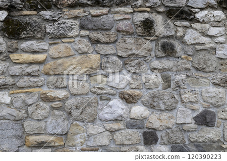 The background with stones. Stone wall background.  Old wall cement texture. 120390223