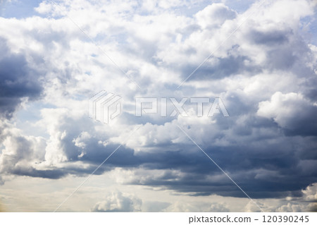 Blue sky background. The clouds on the sky. Colorful blue sky view in bright tones. 120390245