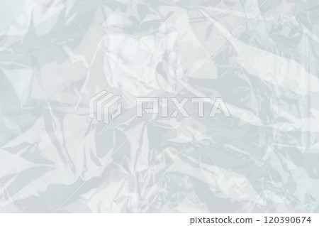 Wrinkled transparent plastic sheet with soft light reflections in bright environment Wrinkled transparent plastic sheet with soft light reflections in bright environment 120390674