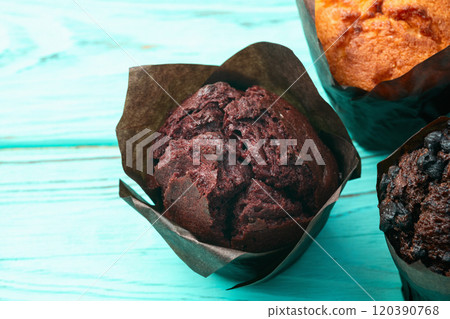 Mix of muffins ( cupcake ) chocolate , vanilla , berries . Top view Mix of muffins ( cupcake ) chocolate , vanilla , berries . Top view 120390768