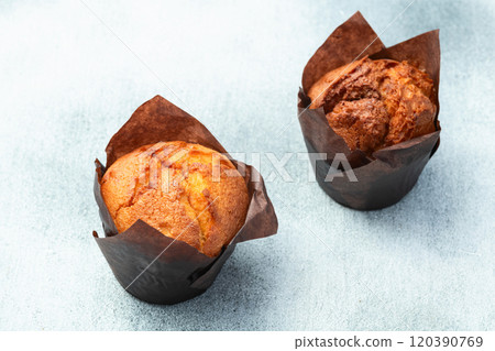 Sweet Baked vanilla muffins ( cupcake ) . Top view Sweet Baked vanilla muffins ( cupcake ) . Top view 120390769