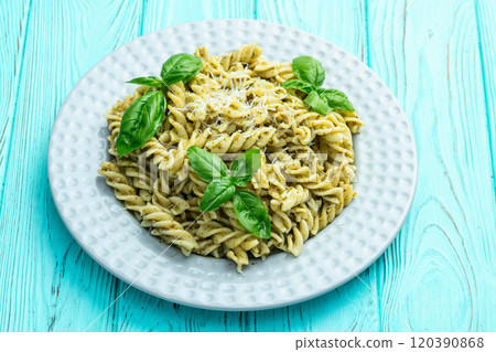 Pasta with basil sauce pesto . Italian food photography . Top view Pasta with basil sauce pesto . Italian food photography . Top view 120390868