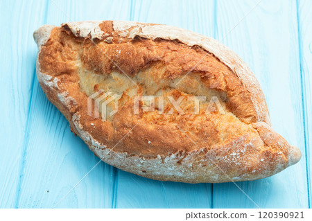 Loaf of  wheat hearth bread . Top view 120390921