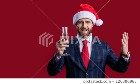 smiling new year businessman in santa hat celebrating. businessman celebrating holiday. smiling new year businessman in santa hat celebrating. businessman celebrating holiday. 120390963