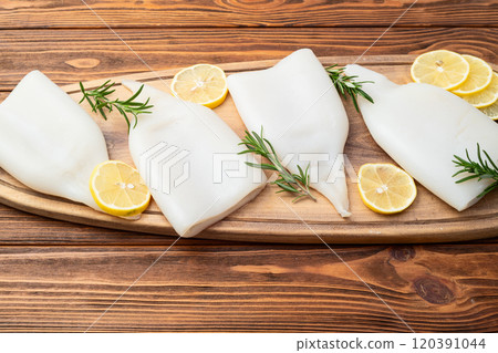 Squid tube and ring photography . Seafood top view 120391044