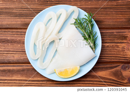 Squid tube and ring photography . Seafood top view 120391045