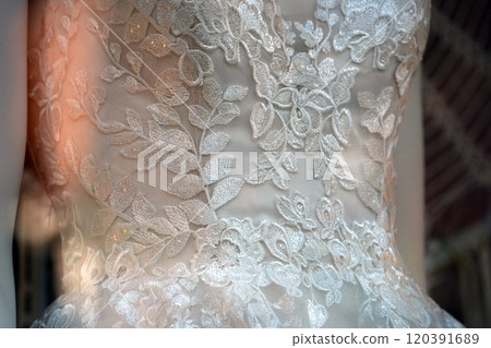 bride dress on a mannequin detail 120391689