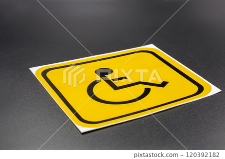 Disability sign for placement on a vehicle closeup. Disability sign for placement on a vehicle closeup. 120392182