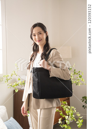 Businesswoman going to work Businesswoman going to work 120393152
