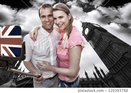 Couple in love taking a selfie portrait in front of Big Ben on their way around Westminster in London, England 120393788