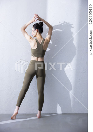 Woman in yoga wear Woman in yoga wear 120395459