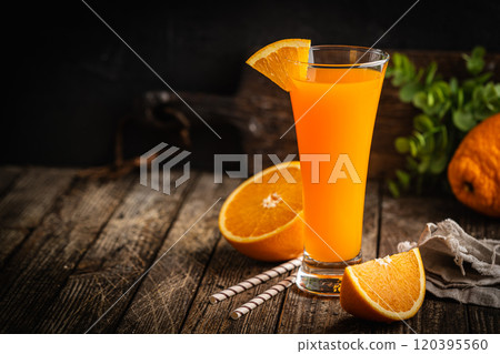 Fresh organic orange drink or cocktail Fresh organic orange drink or cocktail 120395560