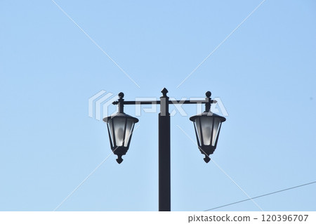 Blue sky and retro street lights 120396707