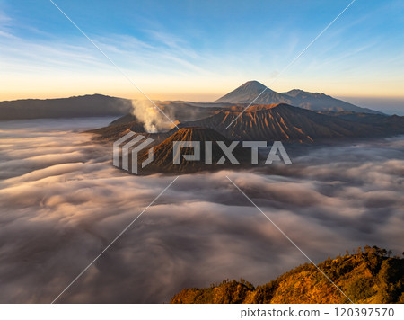 Aerial view Mountains at Bromo volcano during sunrise sky,Beautiful Mountains Penanjakan in Bromo Tengger Semeru National Park,East Java,Indonesia.Nature landscape background 120397570