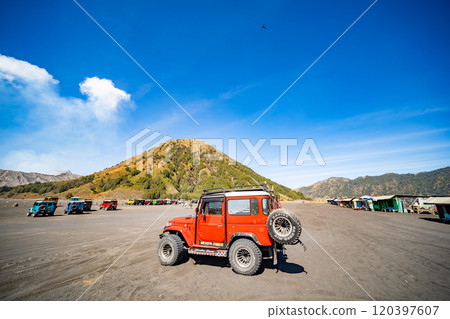 Java Indonesia on September 11,2024 : Tourists 4x4 red Jeep for tourist rent at Mount Bromo,The active Mount Bromo is popular visited tourist attractions in East Java, Indonesia Java Indonesia on September 11,2024 : Tourists 4x4 red Jeep for tourist rent at Mount Bromo,The active Mount Bromo is popular visited tourist attractions in East Java, Indonesia 120397607