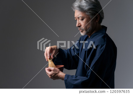 Senior man making tea 120397635