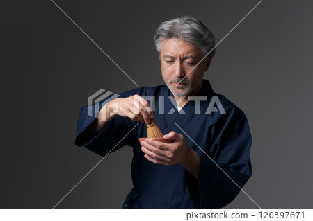 Senior man making tea 120397671