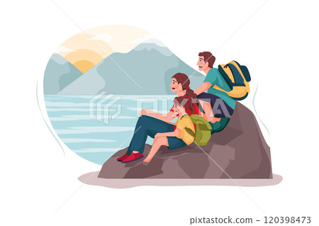 A small family is watching the sunset on the rock. 120398473