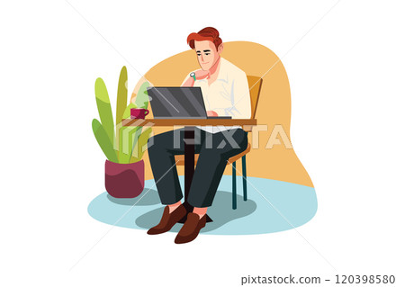 A man sitting at a cafe working on a laptop 120398580