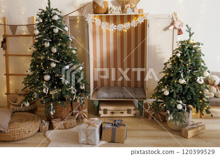 Children's bedroom with a Christmas tree and a tent. Children's bedroom with a Christmas tree and a tent. 120399529
