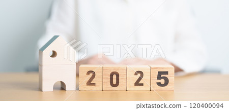Happy New Year 2025 with house model. real estate, Home loan and mortgage, tax, investment, financial, savings and New Year Resolution concepts Happy New Year 2025 with house model. real estate, Home loan and mortgage, tax, investment, financial, savings and New Year Resolution concepts 120400094