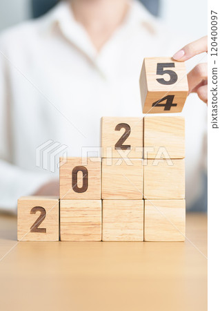 2024 change to 2025 year block on table. goal, Resolution, strategy, plan, start, budget, mission, action, motivation and New Year concepts 2024 change to 2025 year block on table. goal, Resolution, strategy, plan, start, budget, mission, action, motivation and New Year concepts 120400097