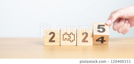 2024 year change to 2025 year block with jigsaw puzzle icon. Business Process, Team, teamwork, Goal, mission, Resolution, strategy, plan, Action, partnership, and New Year start 120400151