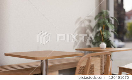 A space for displaying products on a wooden tabletop in a minimalist Japandi coffee shop. 120401070