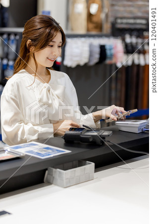 paypay QR code Woman paying with smartphone 120401491