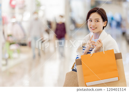 Woman satisfied with explosive shopping Woman satisfied with explosive shopping 120401514