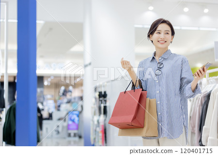 Woman satisfied with explosive shopping 120401715